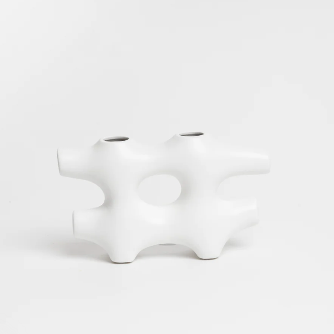 White abstract vase on a white background
