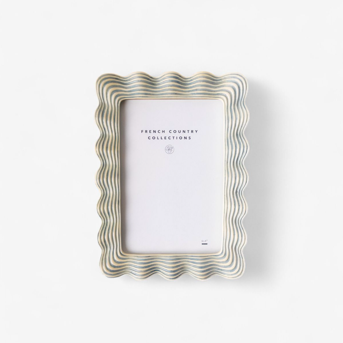Decorative photo frame with wavy design on a white background