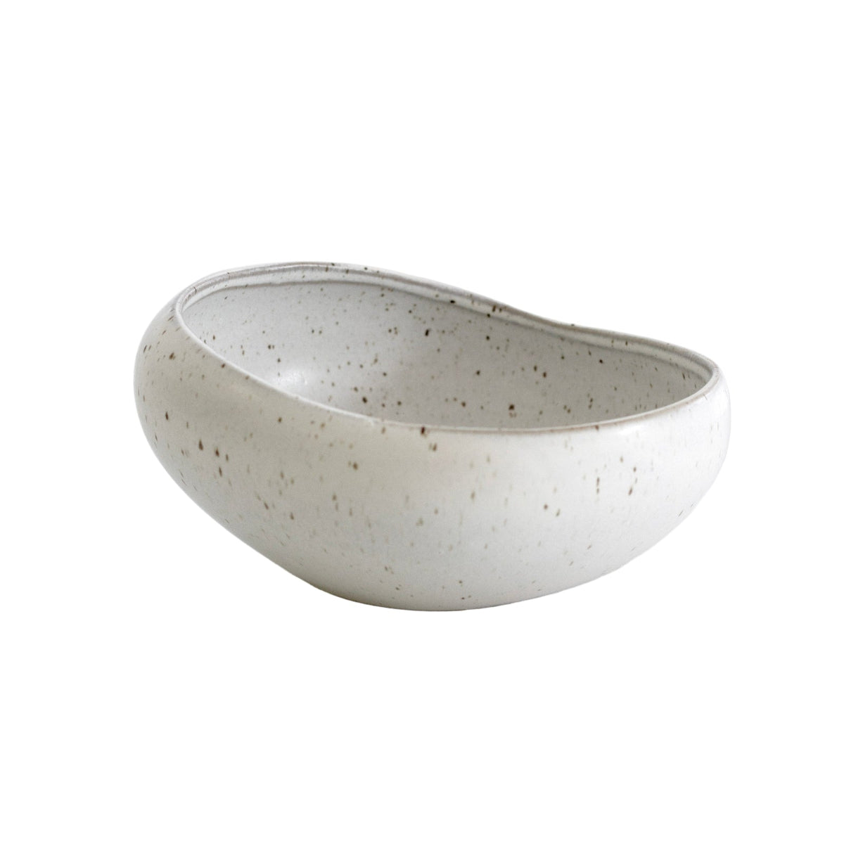 Speckled off-white ceramic bowl on a white background