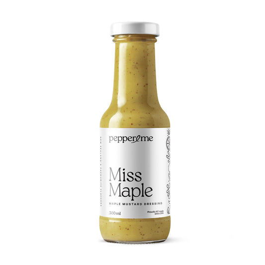 Pepper & Me bottle of 'Miss Maple' maple mustard dressing with a white label on a white background