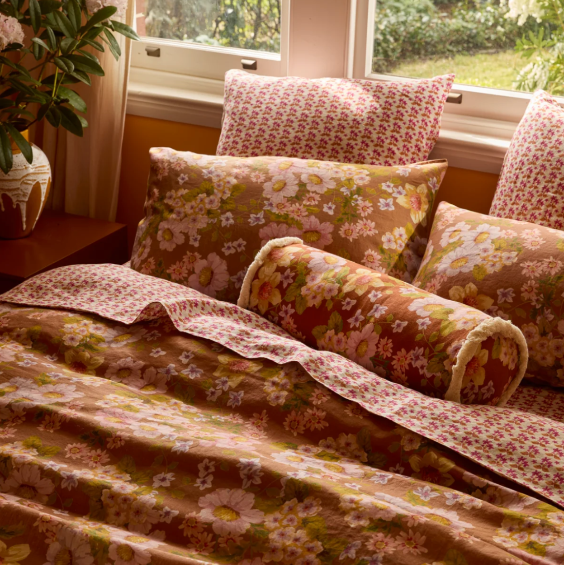 Bonnie & Neil Buttercup Bolster Cushion | Rust