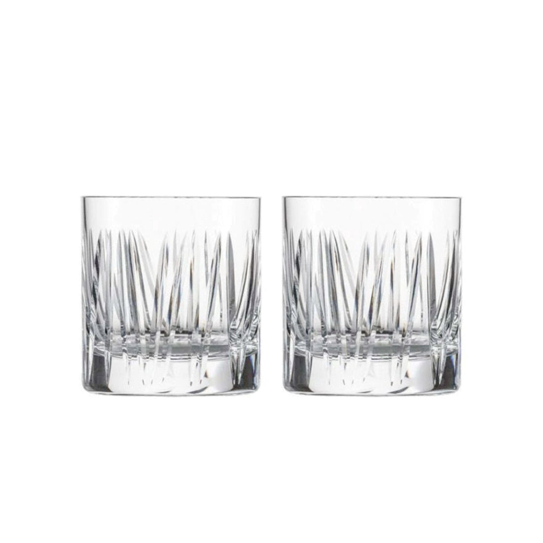 Two clear glass tumblers with textured design on a white background