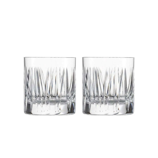 Two clear glass tumblers with textured design on a white background