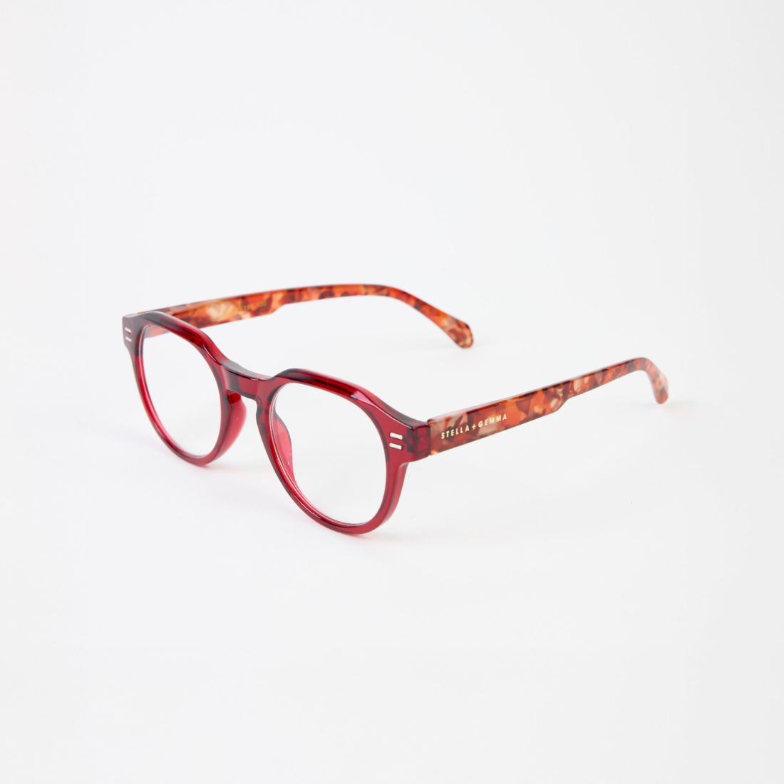Red eyeglasses with tortoiseshell pattern on a white background
