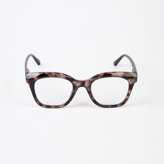 Tortoiseshell cat-eye glasses on a white background