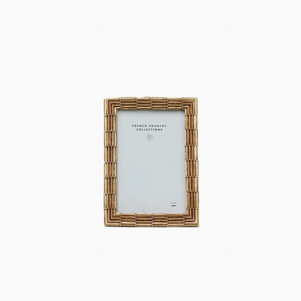 Champagne metal picture frame on a white background