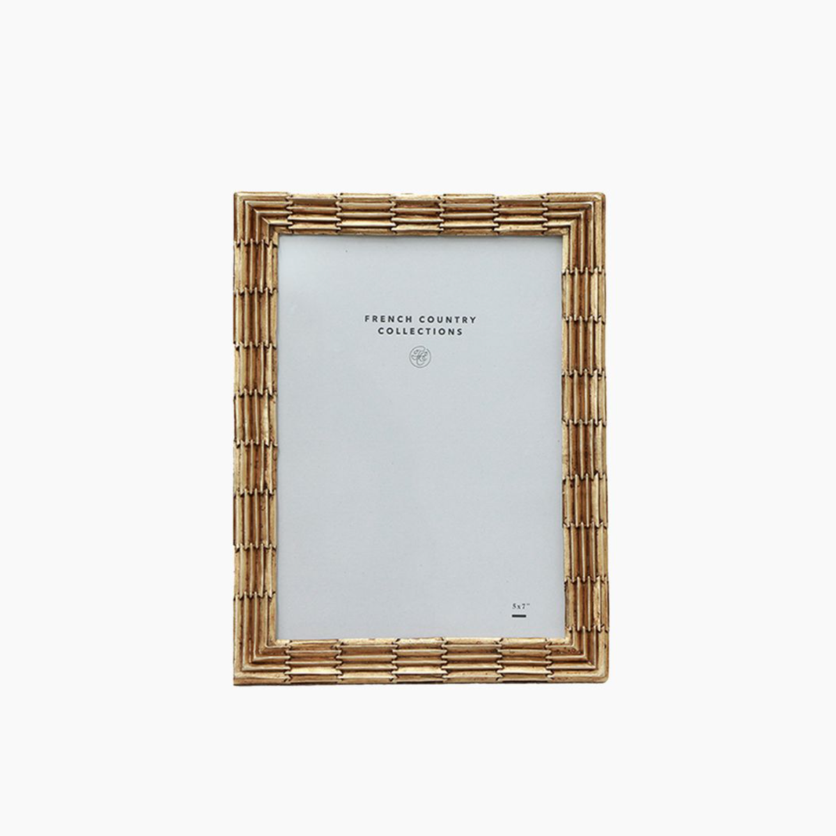 Champagne metal picture frame on a white background